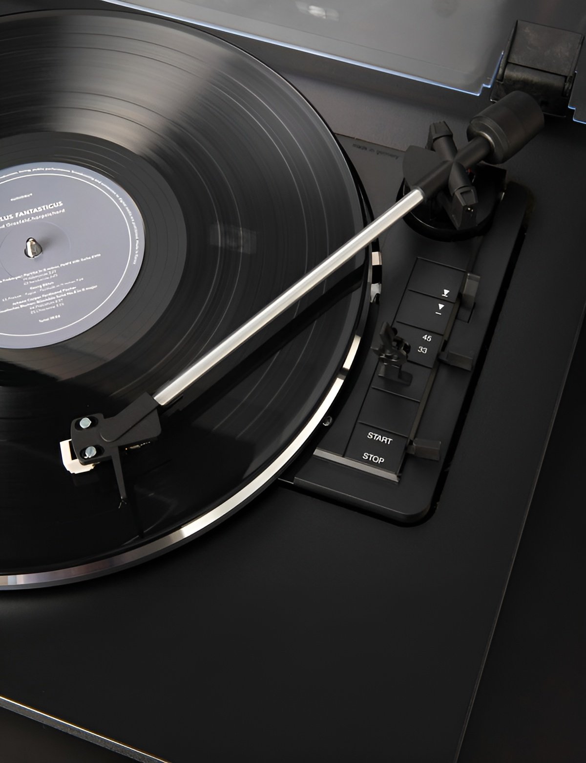 When the switch is set to Start, the platter automatically rotates, the tonearm moves sideways, and then lowers, lowering the cartridge stylus over the LP to play the music. 