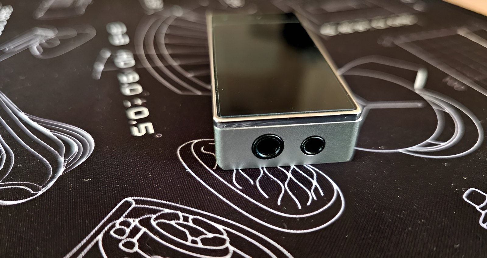 FiiO QX13 is presented as a regular USB-dongle, which implies its mobile use. 