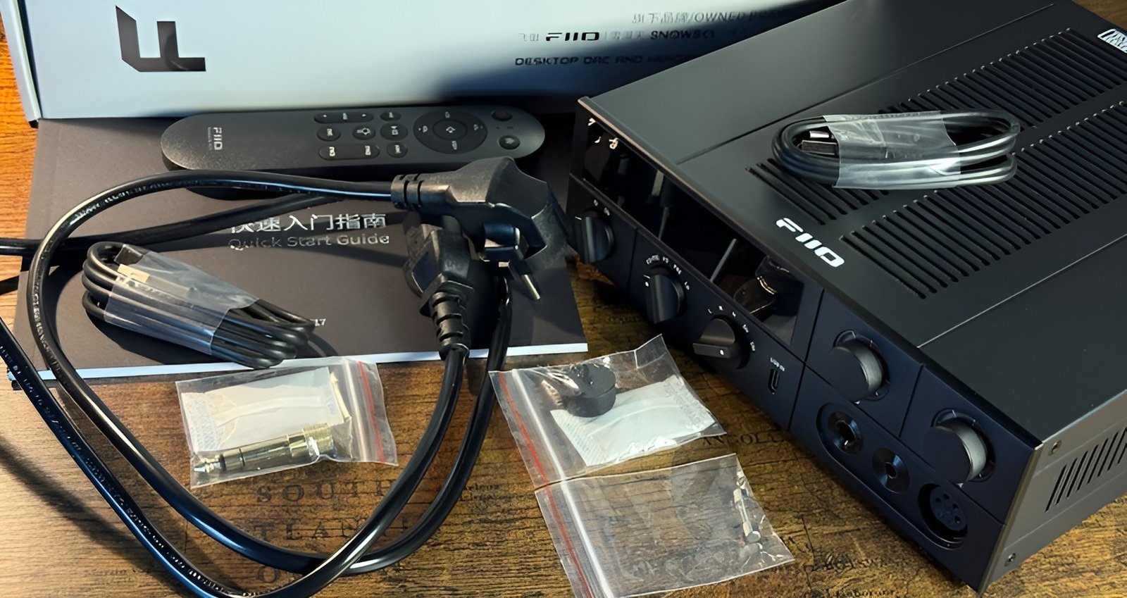 The FiiO K17 combines retro-inspired design with a modern touchscreen interface, creating a unique visual and tactile experience.